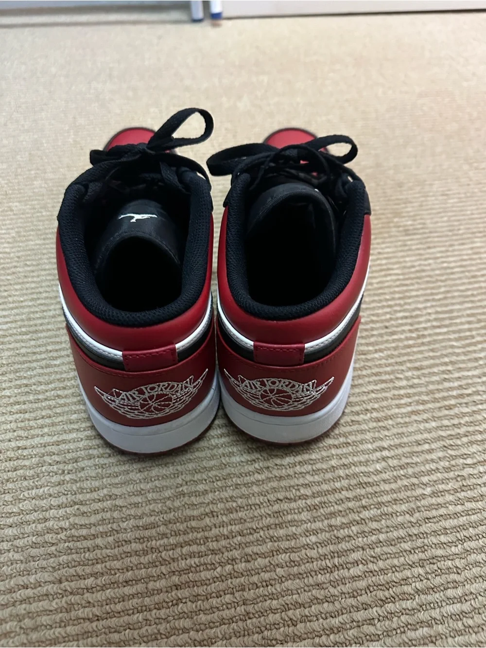 Jordan1 Men's Low-Top Sneakers in Black, Red & White